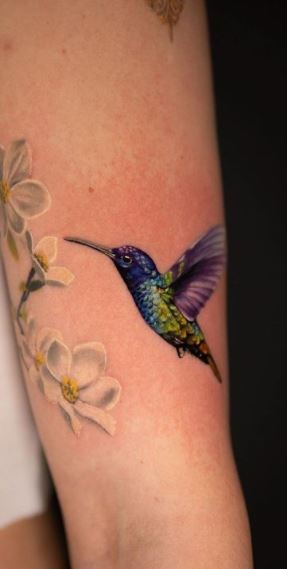 hummingbird on my foot tattoo