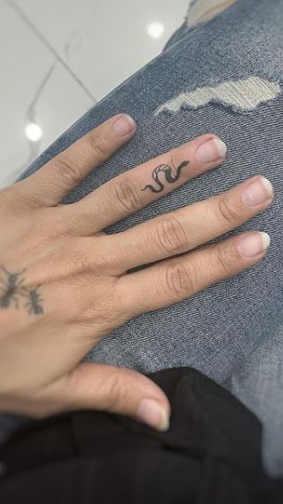 Snake Tattoo on Finger Meaning Personal Stories and Symbolism Behind Body  Art  Impeccable Nest
