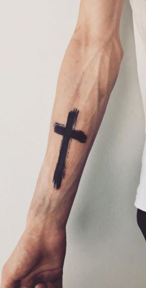 cross tattoo side wrist
