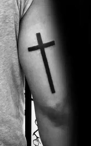 Cross Bicep  Religious and Spiritual Tattoos  Last Sparrow Tattoo