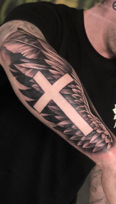 Black Celtic Cross Tattoo On Forearm