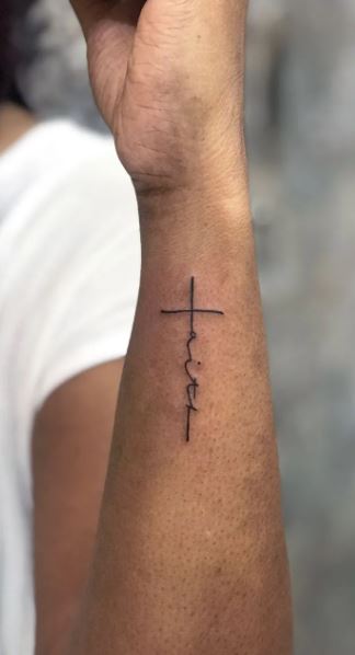cross tattoo side wrist