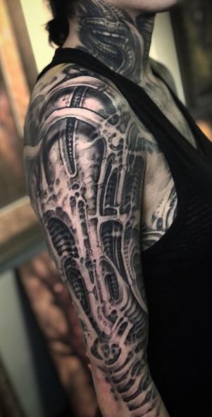 Skull on neck tattoo by Bob Tyrrell  Tattoos