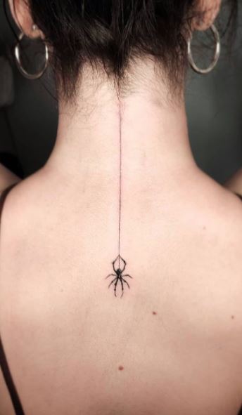Spider Widow Behind Ear Tattoo