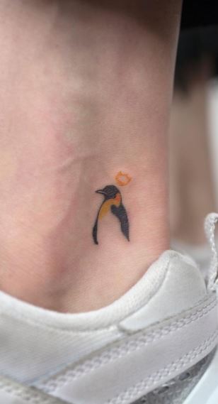 Little penguin tattoo on the right hand