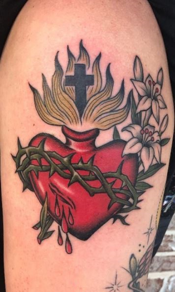 sacred heart tattoo on handTikTok Search