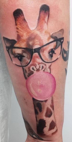 Giraffe Tattoo - TattooLopediaTattooLopedia