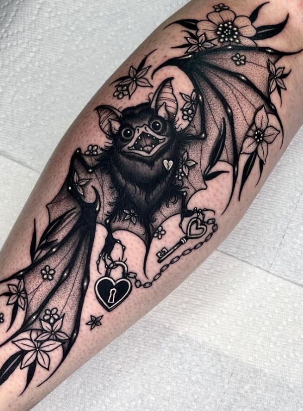 bat hanging upside down tattoo