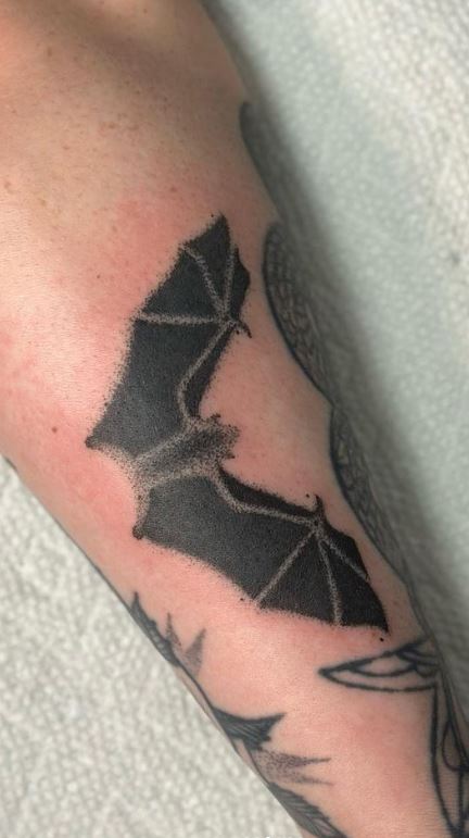 flying bats tattoo