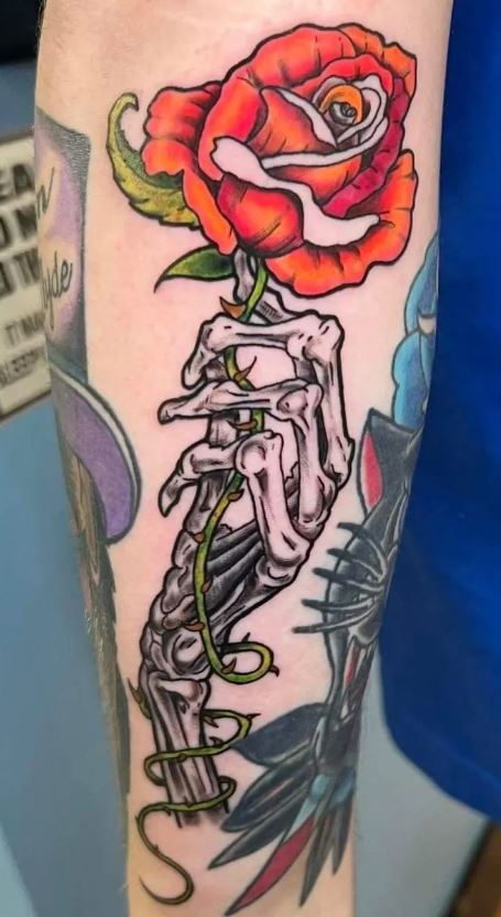 Skeleton hand with wilted flowers  Psychic Seas Tattoo  Facebook