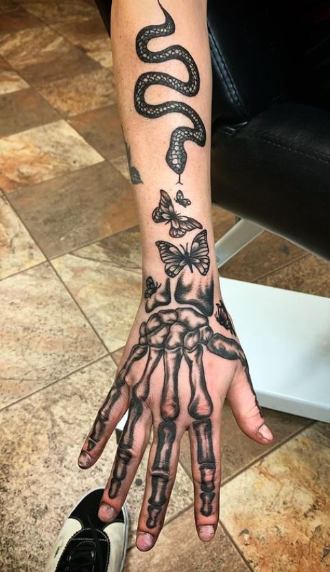 KILO on Instagram  Freehand skeleton hand tattoo w butterfly  cluster Dope addition to this half sleeve I started designerink  atltattooartist