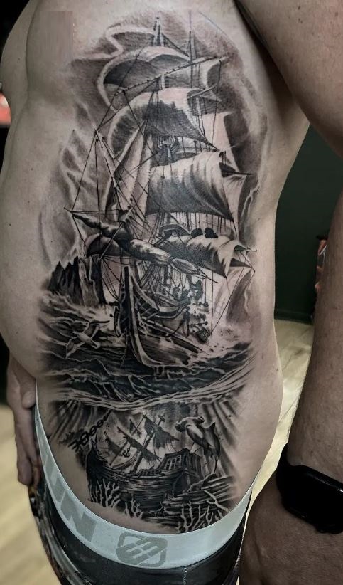 Black And Grey Pirate Ship Tattoo Design For Sleeve