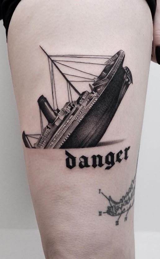 sailboat tattoo arm