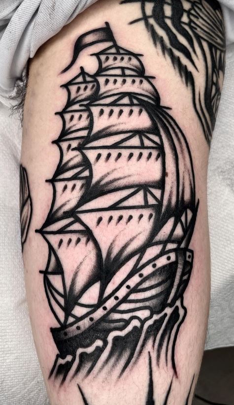 sailboat tattoo arm