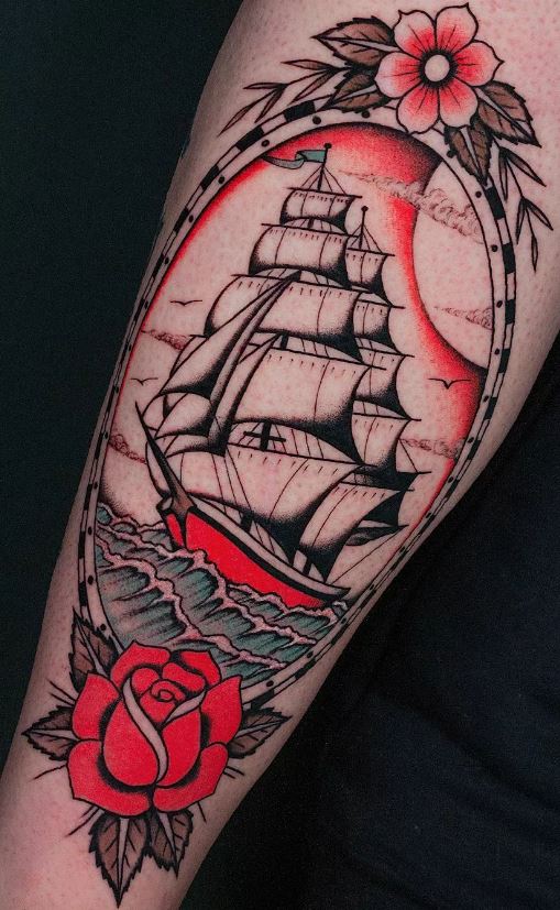 sailboat tattoo on shoulder