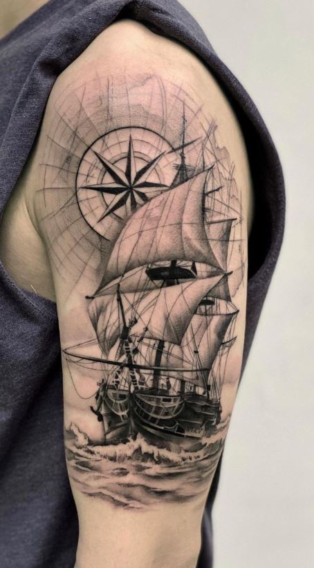 sailboat tattoo on shoulder