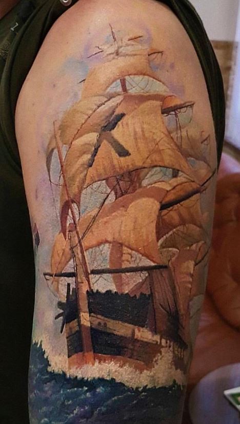 sailboat tattoo arm