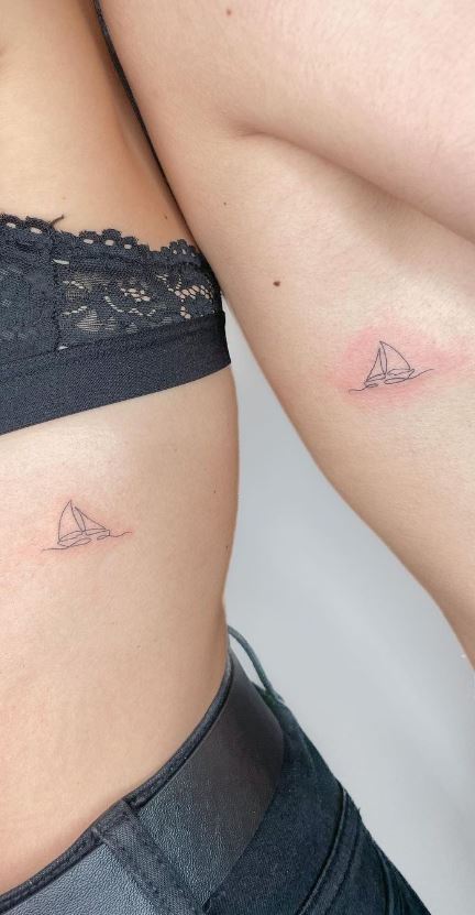 sailboat tattoo thigh