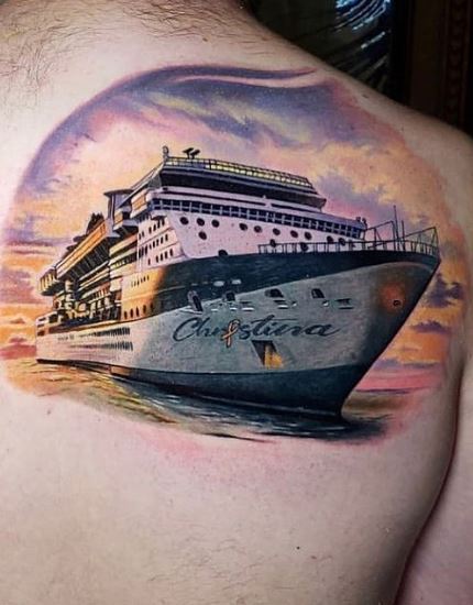 sailboat tattoo on shoulder