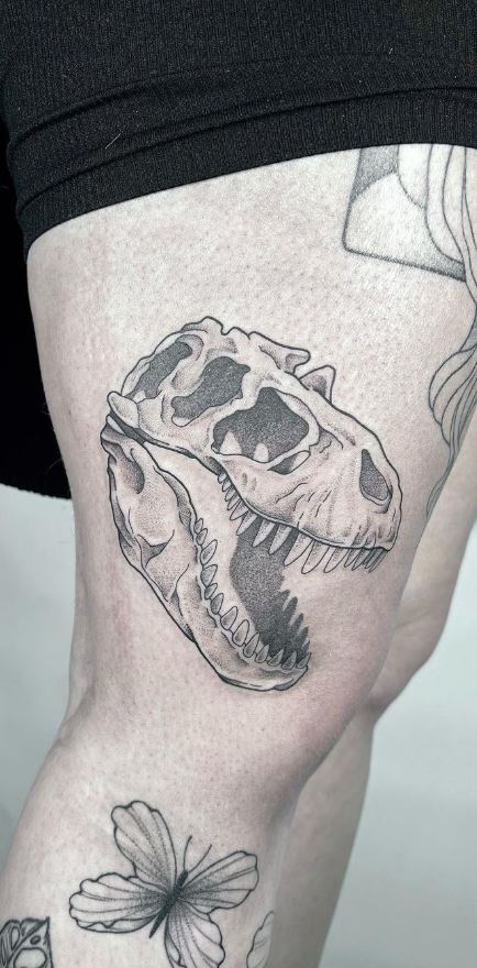 Chris Brown Reveals Gigantic Dinosaur Skeleton Tattoo on His Side  PopStarTats