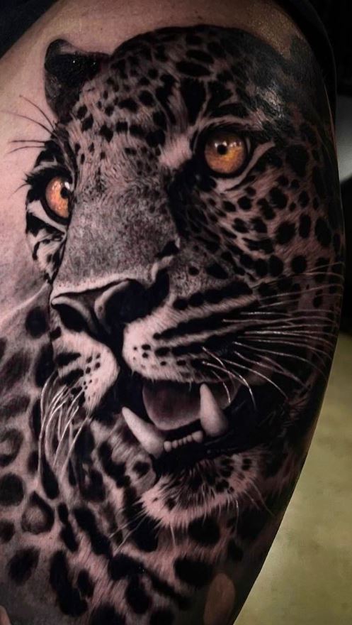 Jaguar tattoo on the forearm