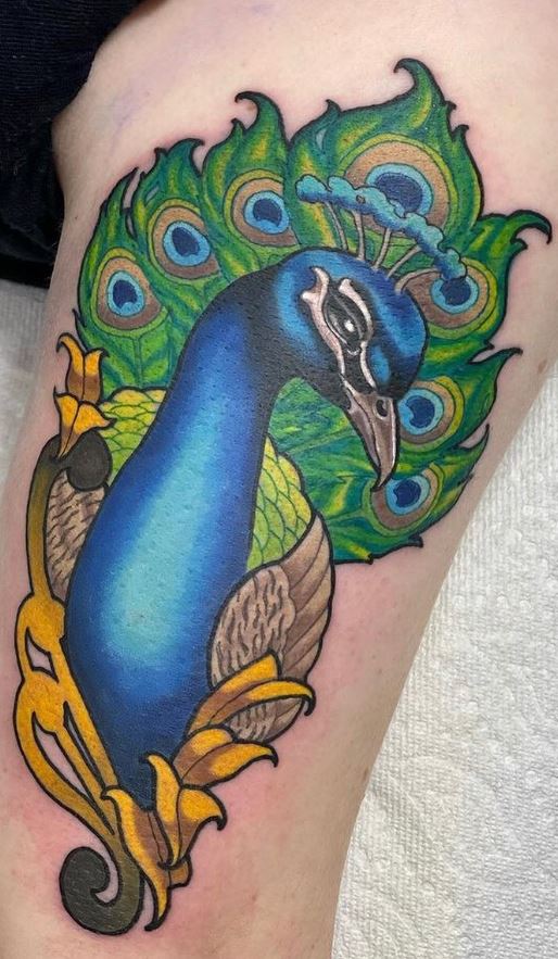 47 Vibrant Peacock Tattoo Designs  Their Meaning  Tattoo Glee